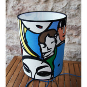Cylindrical lampshade table lamp covered with cotton fabric, colorful abstract characters.