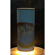 Table lamp with Acquarius sea foam green wallpaper shade from Cole and Son