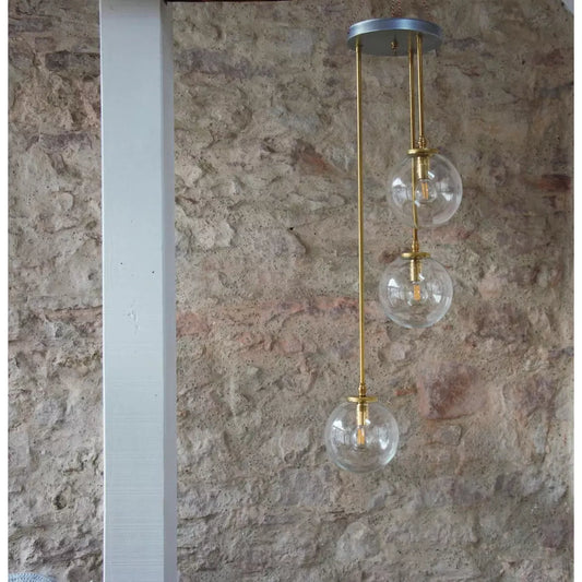 Suspension moderne "Bubble" en laiton et verre. Pièce unique.
