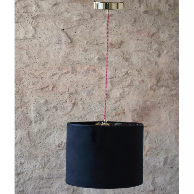 Pendant light with double-sided black velvet and floral velvet lampshade.