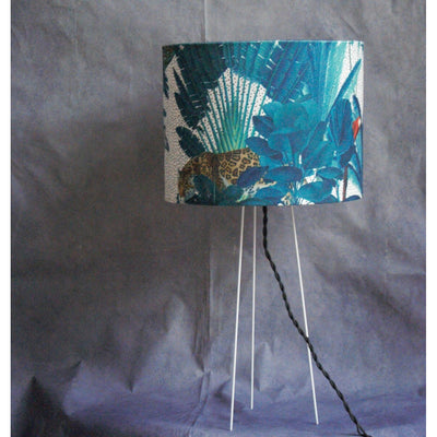Children's table lamp with velvet drum shade on transparent polyphane.