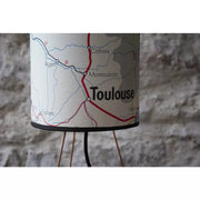 Old school map lampshade table lamp transport south of France on tripod base in raw brass