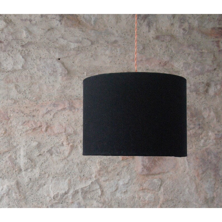 Double-sided lampshade suspension: black cotton jeans and designer non-woven wallpaper.