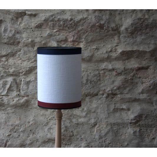 Abat-jour rond en lin, bordure noire, bleu marine et chocolat.